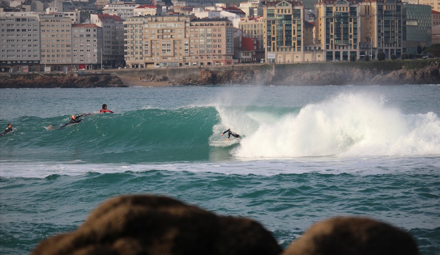 Sick angle and nice backdrop compliment this little drainer perfectly. Playa del Orzan, Spain. 2/9/17. Surfer: Jos Kelly. Photographer: Gabriel Pacheco