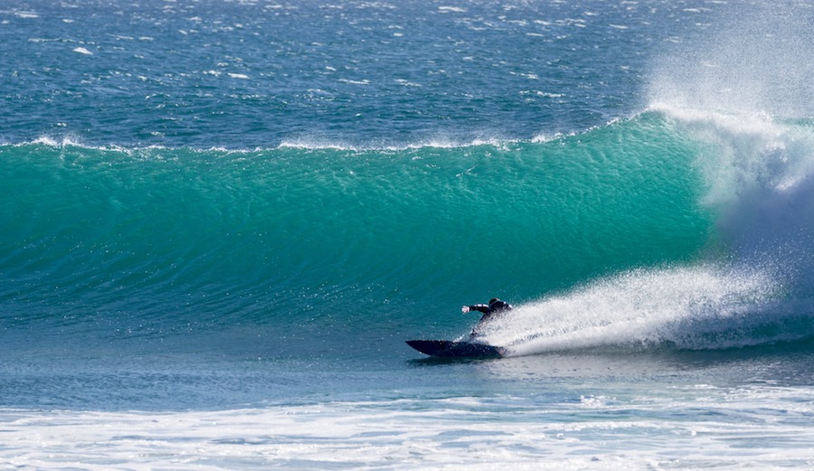 Morocco = perfect right points. This shot captures the perfect point break bottom turn while also inviting us to mind surf the groomed canvas that lays ahead. Anchor Point, Morocco. 1/20/17. Photographer: Luke Dawson