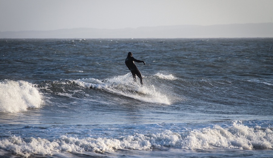 Walking on water in the freezing Baltic Sea. Weissenhaus, Germany. 1/2/17. Photographer: Christoph Pless