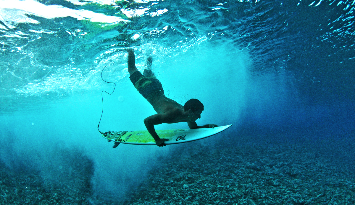 Guys get duckdive photos, too. Nathan Carvalho proving it can be done. Photo: <a href=\"https://www.facebook.com/pages/Jared-Sislin-Photography/258114520882025\">Jared Sislin</a>