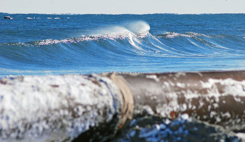 This wave breaks a final few times before the dredging begins. Photo: Tim Leopold 