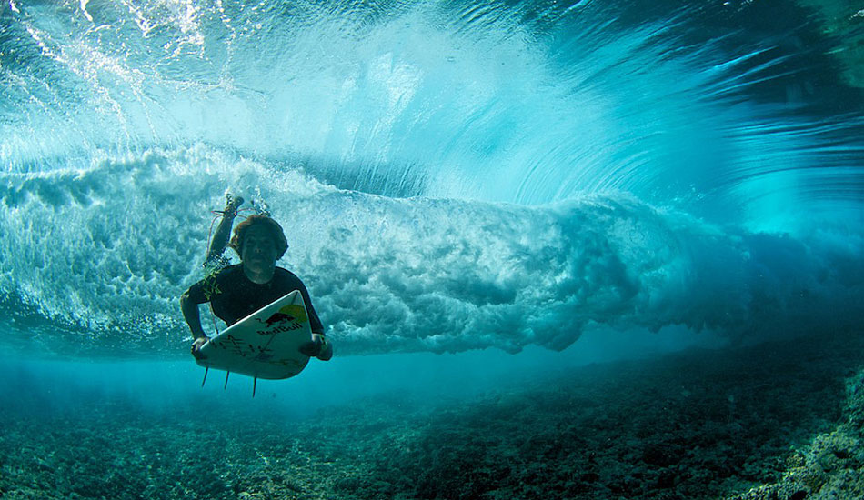 Kai Lenny duckdiving in Tahiti. Photo: <a href=\"http://www.timmckennaphoto.com/\" target=_blank>Tim McKenna</a>.