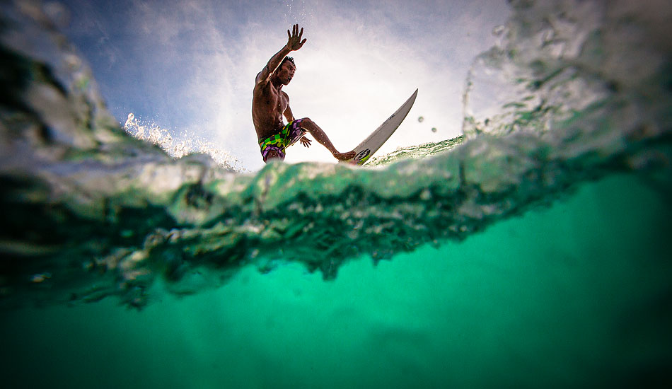 Shooting an over-under surf shot like this one with Bingin local Teko comes down to being lucky with the camera shutter. But don\'t they say it\'s better to be lucky than good? Photo: <a href= \"http://tommyschultz.com/blog/category/photo-galleries/surf-photography-2/\">Tommy Schultz</a>