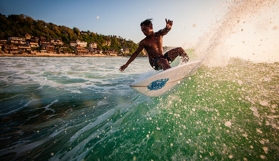 Visit any of Bali\'s famous surf spots and you\'ll find the next generation of Indonesian surfers sharpening their skills. Photo: <a href= \"http://tommyschultz.com/blog/category/photo-galleries/surf-photography-2/\">Tommy Schultz</a>