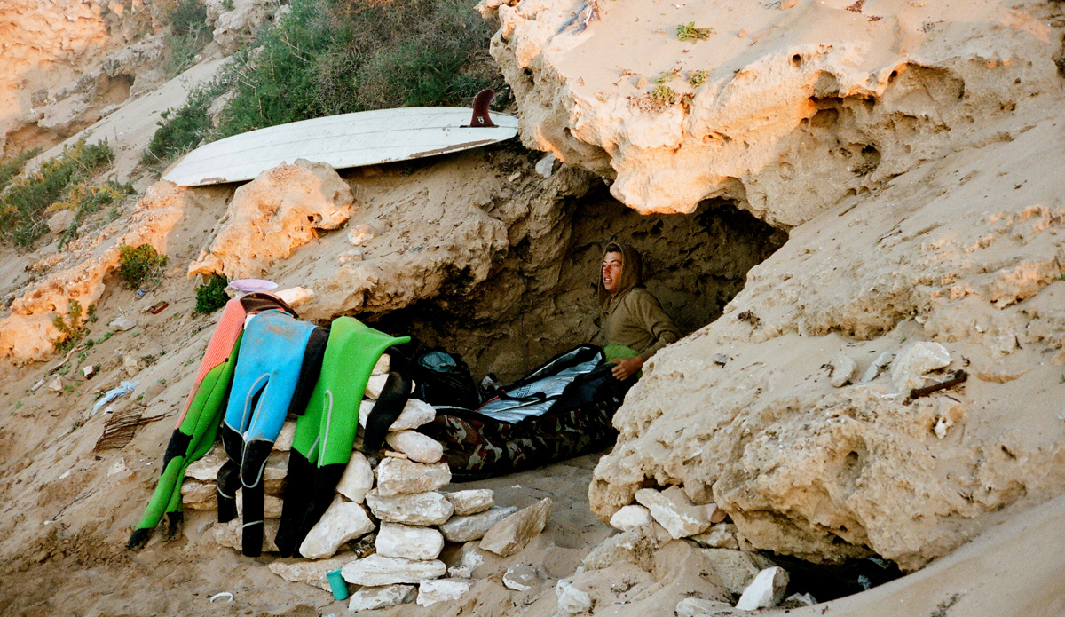 This is Ryan Burch in a Moroccan sand cave. We were on a trip with Thomas Campbell shooting for his new book and spent the whole day surfing here at this really fun spot… we couldn’t leave, so we spent the night and slept in our board bags. Central Morocco, 2014. Photo: <a href=\"http://trevorgordonarts.com\">TrevorGordonArts.com</a>