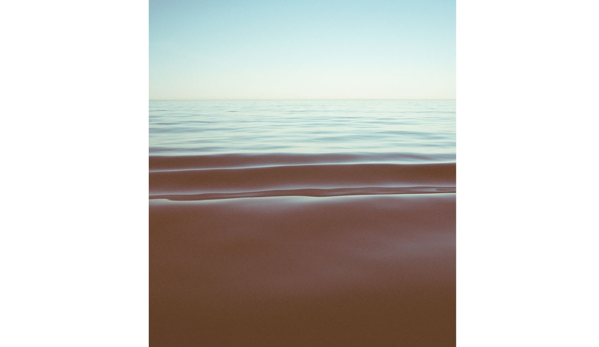 The fall season around the Channel Islands can be extremely calm at times. This is a boat wake as it passes our windless sailboat. Santa Barbara Channel, 2014. Photo: <a href=\"http://trevorgordonarts.com\">TrevorGordonArts.com</a>