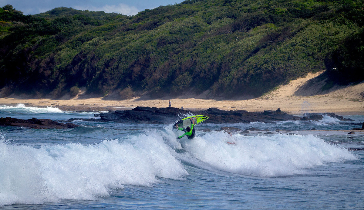 Micro grom, Mitch du Preez throwing everything into his last turn. Photo by: Tyerell Jordaan