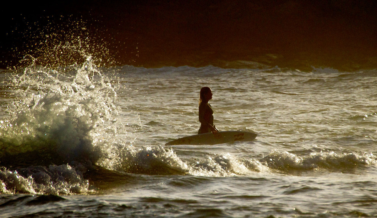 Last one out and that awesome surfed-out feeling, Emma Smith feeling fulfilled. Photo by: Tyerell Jordaan