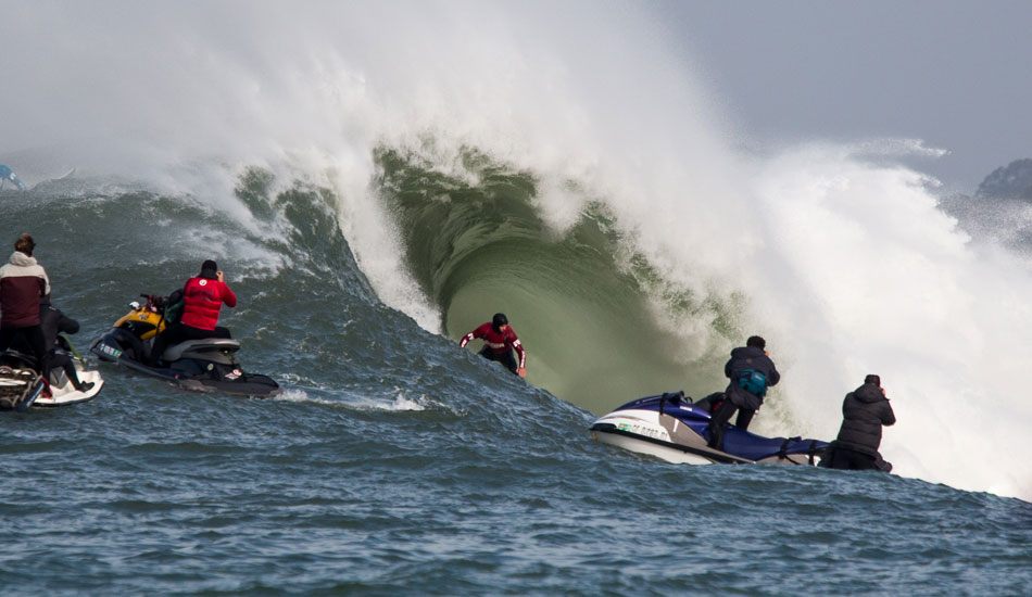 Zach Wormhoudt in a house sized barrel. Photo: <a href=\"http://www.adamwarmington.com/\">Adam Warmington.</a>