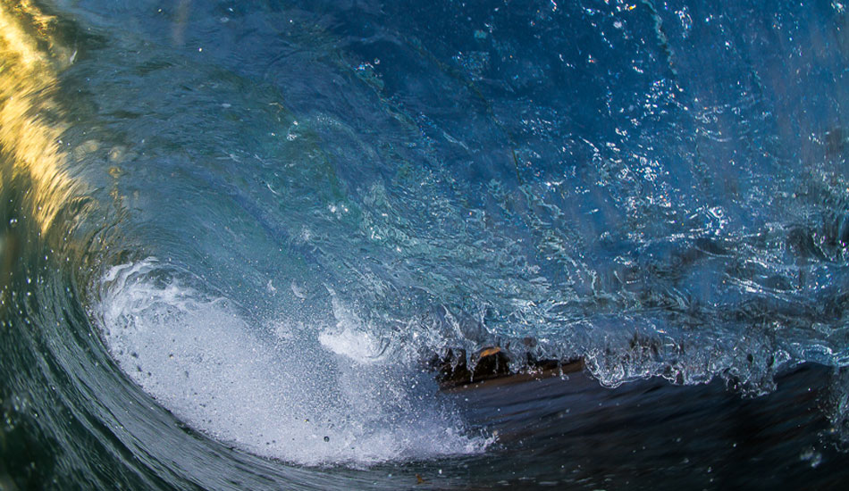 Sunset Cave. My favorite part about this shot is that you can see all the little specs of the barrel about to spit. Photo: <a href=\"http://surfingeye.com/\">Ronald Hons</a>