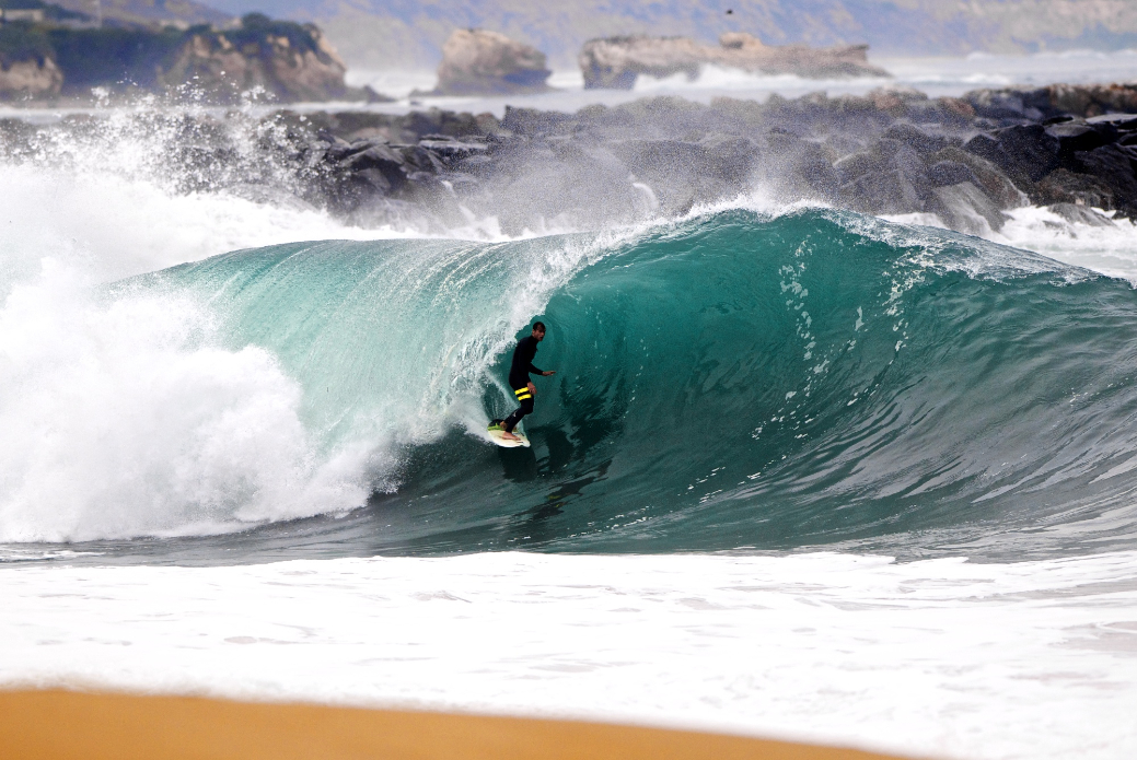 Brad Ettinger scores a rare, glassy, perfect stand-up barrel at Wedge, a break more likely to pound you into the sand than offer an easy exit. Photo: Benjamin Ginsberg / Driftwood Photography Studios