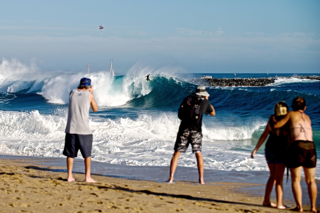 Common sights at Wedge these days: crowds, soft tops, and free falls from the lip. Photo: Benjamin Ginsberg / Driftwood Photography Studios