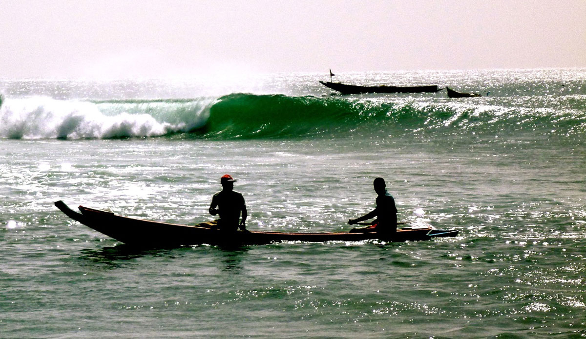 Only fisherman for company just north of the equator. Photo: <a href=\"http://bugsonmyboard.org/\">Gary Conley</a>