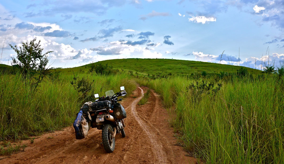 A slippery road ahead the in the congo. Photo: <a href=\"http://bugsonmyboard.org/\">Gary Conley</a>