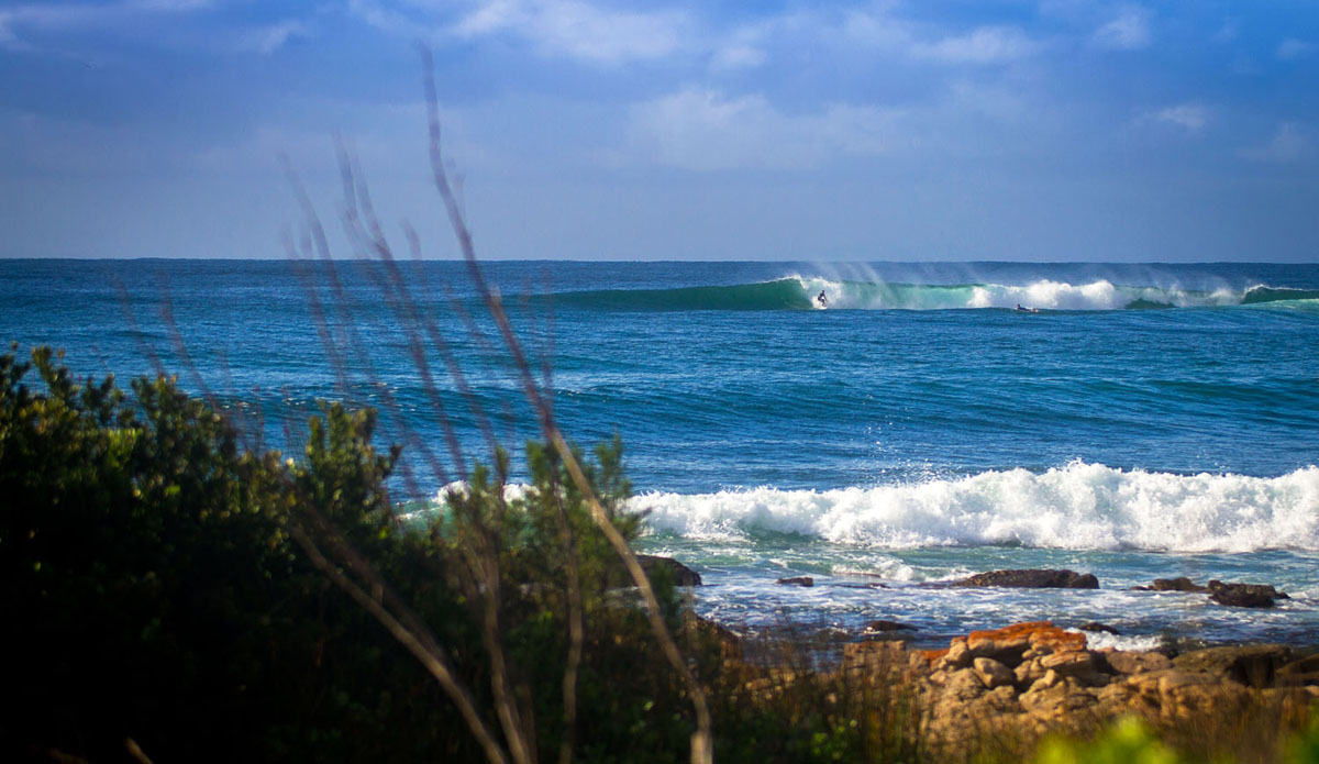 Simon Fish rides a swell born in the cape of our storms.  Photo: <a href=\"https://www.facebook.com/pages/Pho-Tye-Studio/398591356893177?fref=nf\"> Tyerell Jordaan</a>