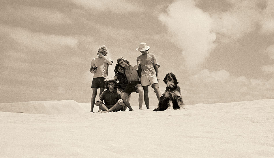 A run-in picture at Cactus – 1971
I’m sure that some of my friends got sick of me sticking a camera in their faces. I was pretty relentless in documenting life around me. This mucking-about picture was taken in the spectacular dunes at Cactus in South Australia after we’d shot an ad for O’Neill wetsuits. Work and play were inextricably mixed up together. Photo: Witzig