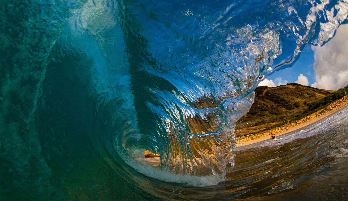 Through the barrel, Sandy Beach, Hawaii. Photo: <a href=\"http://zyphotoz.com/\"> Zach Yeamans</a>