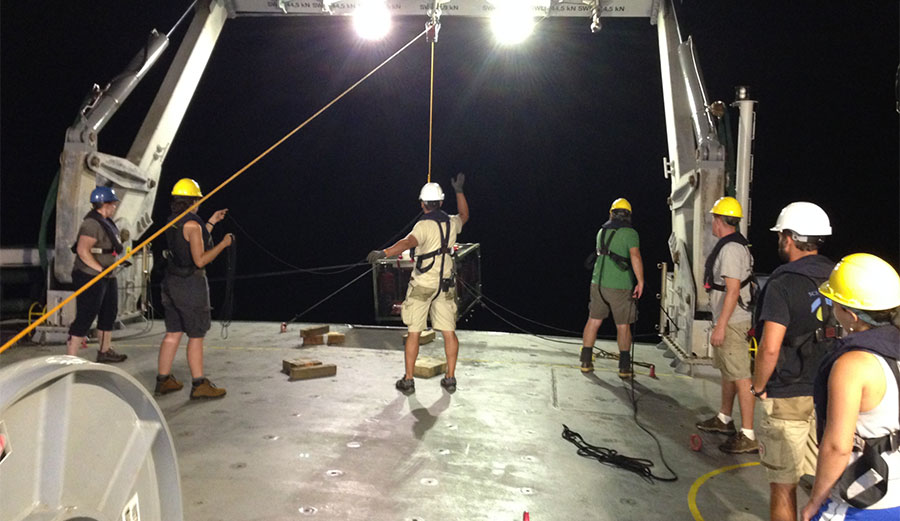 Deploying the fish trap in the Mariana Trench from the R/V Falkor. Image: Schmidt Ocean Institute.