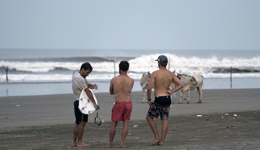 Three Basque surfers, and a little Indian perfection. Photo: Jon Aspuru