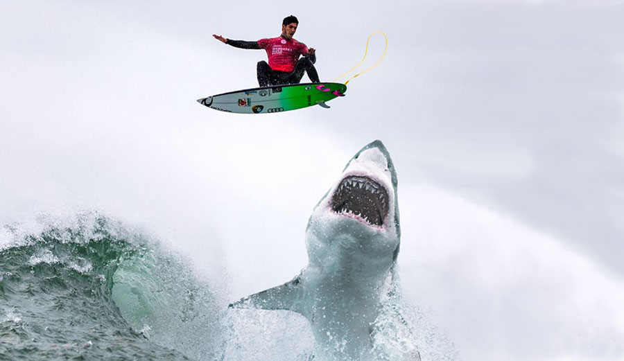 Gabriel Medina surfing over shark