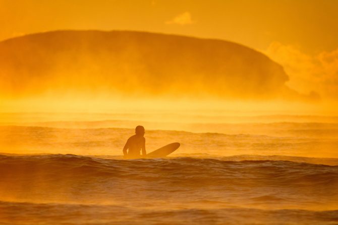 Sunrise Surfer in the Ocean