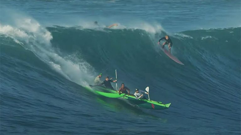 Mark Healey canoe surfing at Waimea Bay