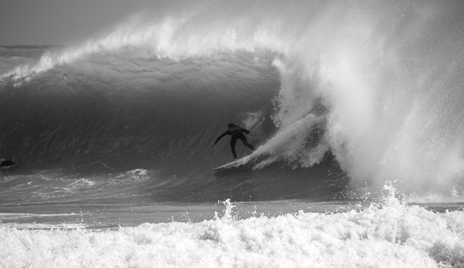 A surfer rides a barrel in Miami