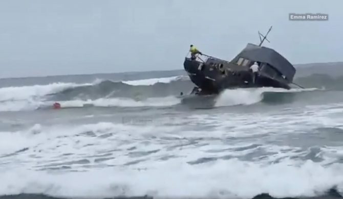 Boat in surf 