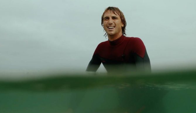 Ian Crane Surfer in Water at San Clemente Pier