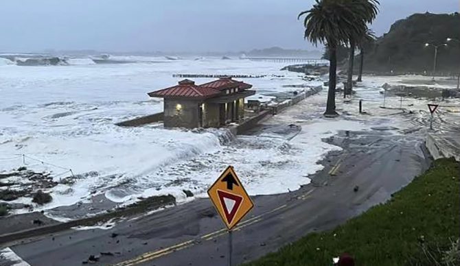 Local Surfer Examines Damage to Santa Cruz