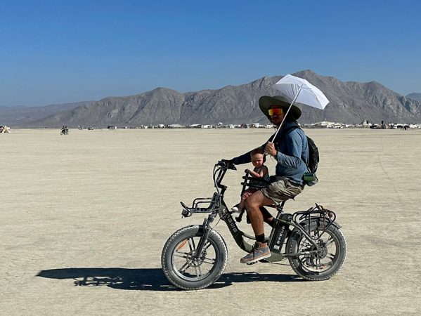 riding through the black rock desert with a baby on the engwe l20 fat tire electric bike