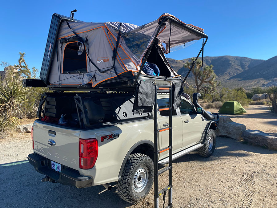 a photo of the roofnest condor 2 rooftop tent on top of a truck in Joshua Tree national park