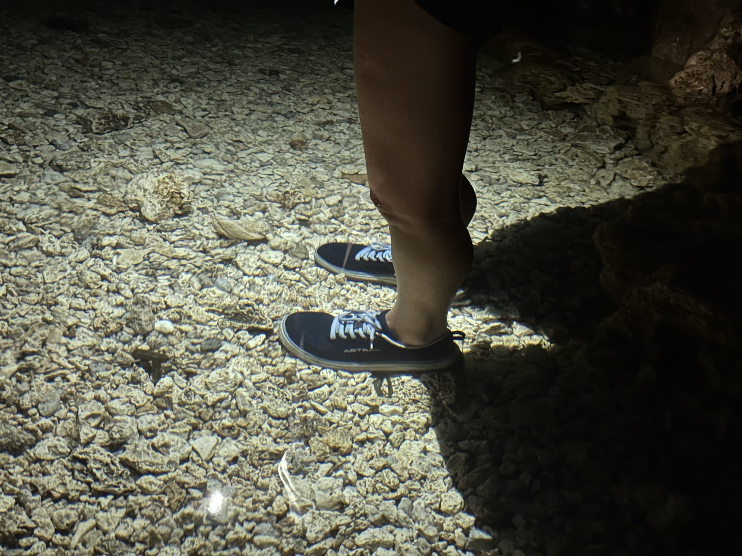 astral brewess 2.0 water shoes underwater in a cave