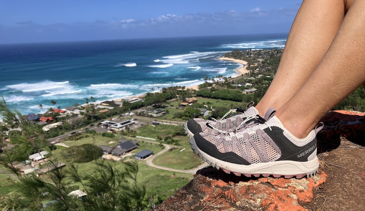 watershoes on the edge of a cliff with an ocean view