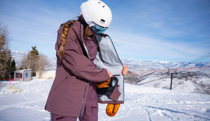 Using the pockets on the Flylow Billie Snowboard Jacket