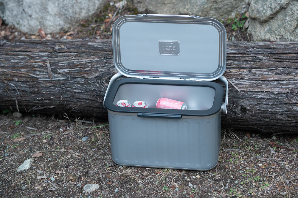 Opening up the contents of the Tempo Oyster cooler to reveal cans inside