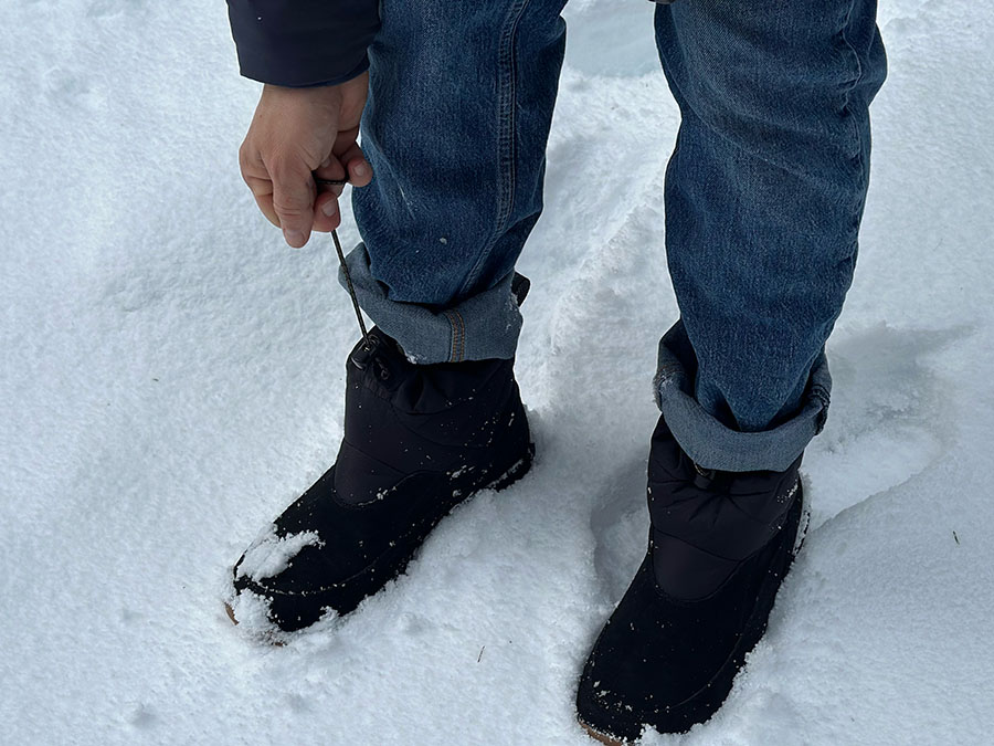 closing the drawstring on the Danner Cloud Cap boots