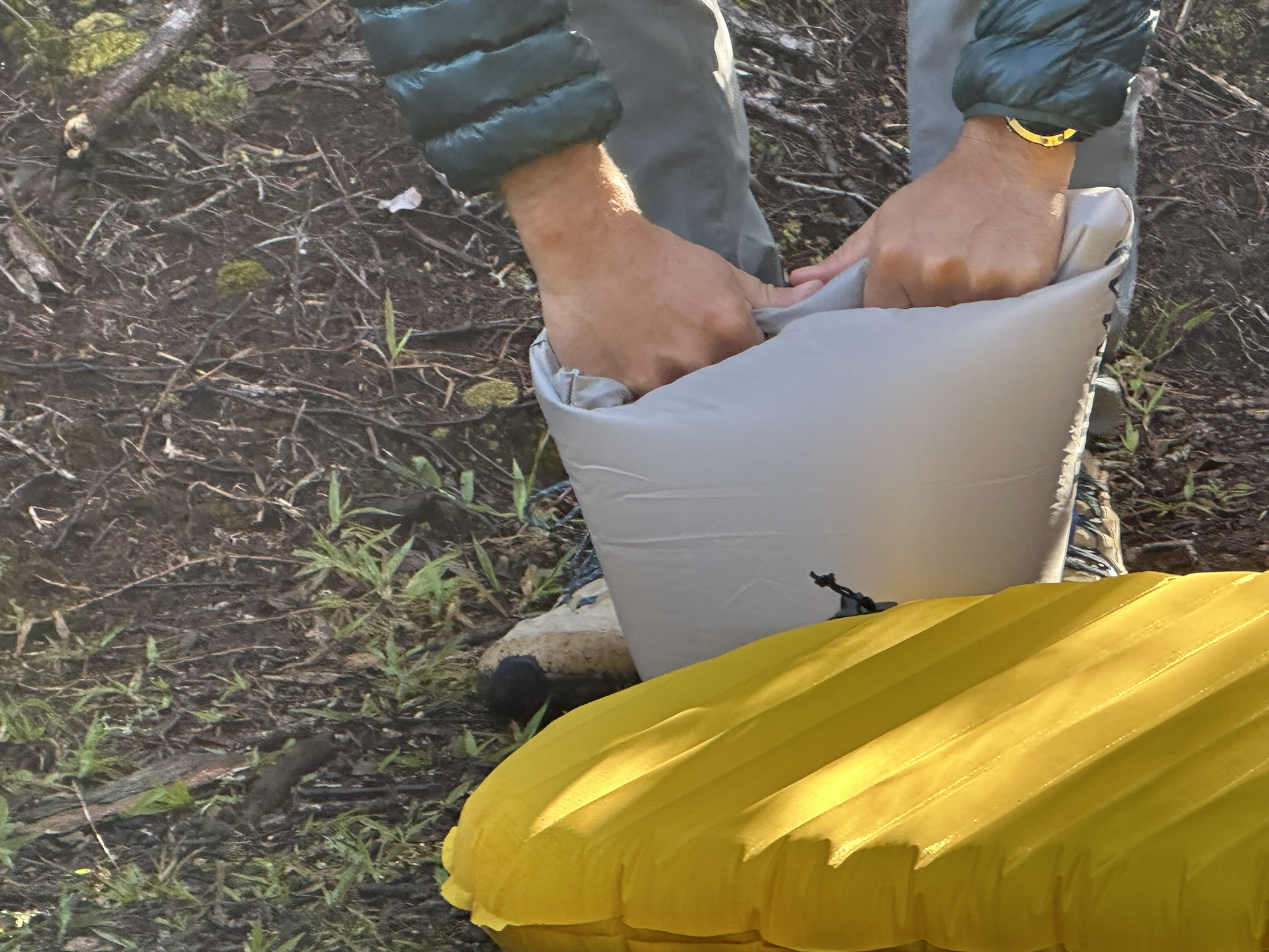 a close up of a pump sack used to inflate one of the backpacking sleeping pads we tested