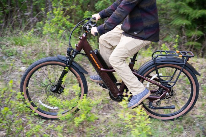 a closeup of the rad radster trail electric bike in motion