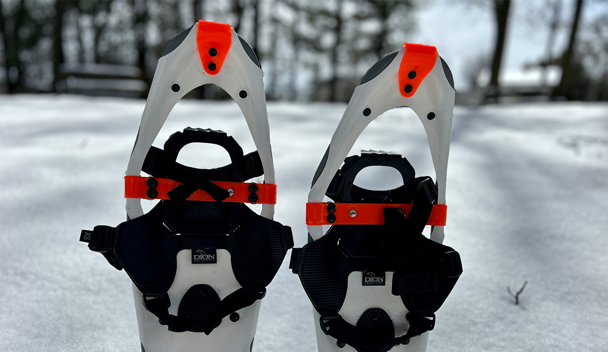 a pair of Dion 121 snowshoes in the snow