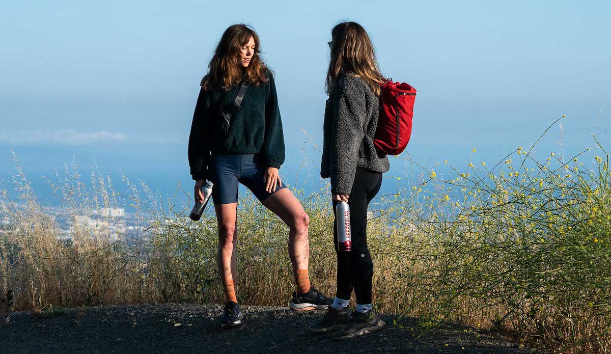 Hikers pause to take in the LA skyline. Photo: Arrowhead