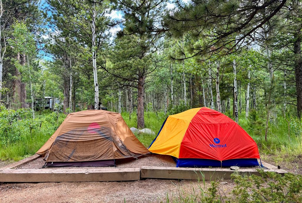 two camping tents in the forest