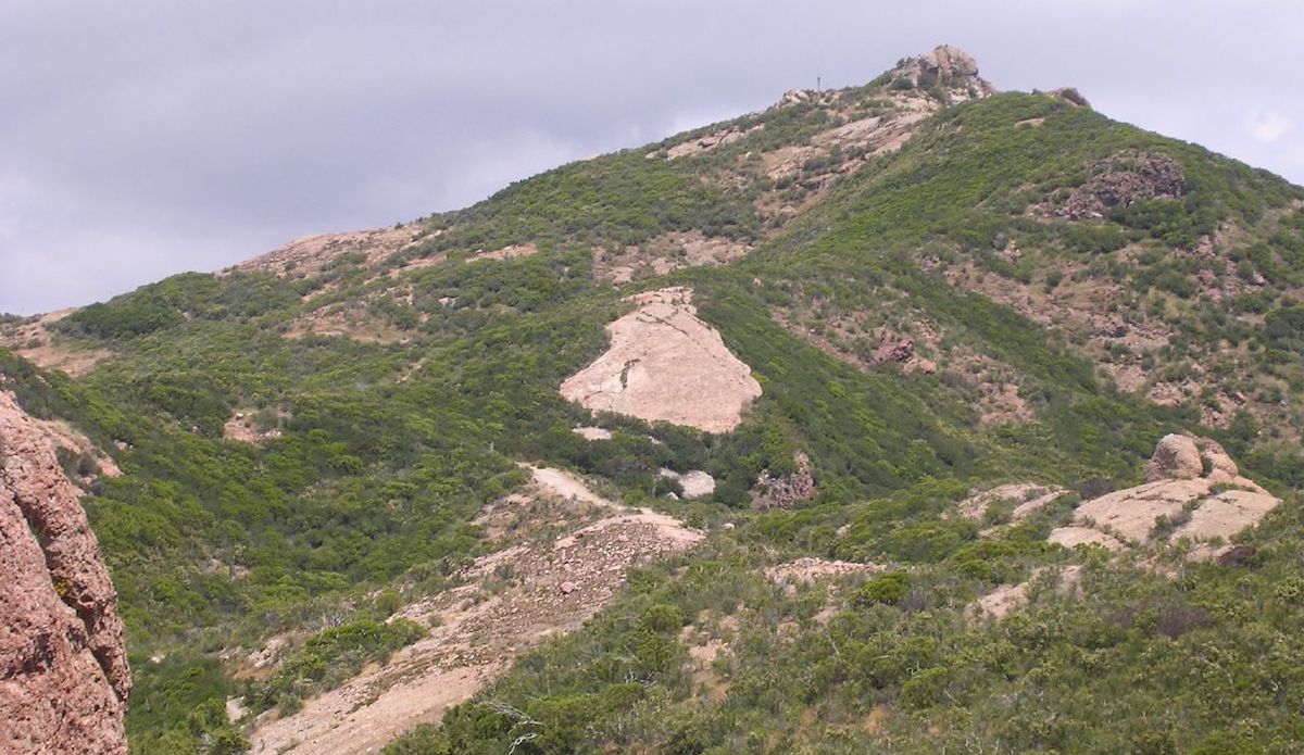 Sandstone Peak rises steeply above Santa Monica. 