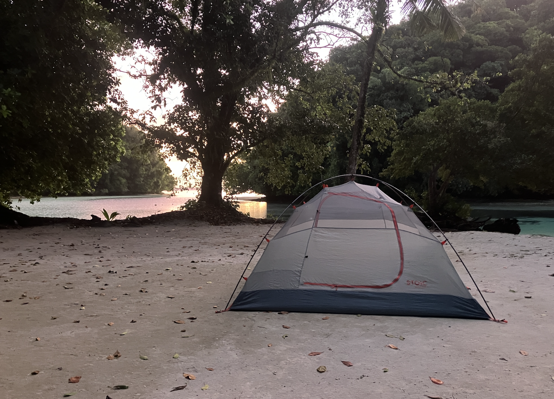 a tent set up at the beach 