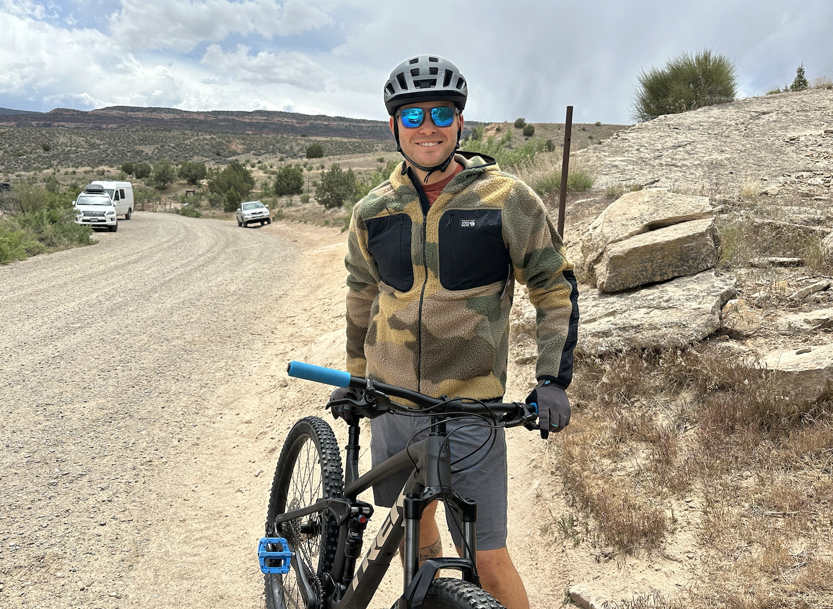 a man holding a mountain bike