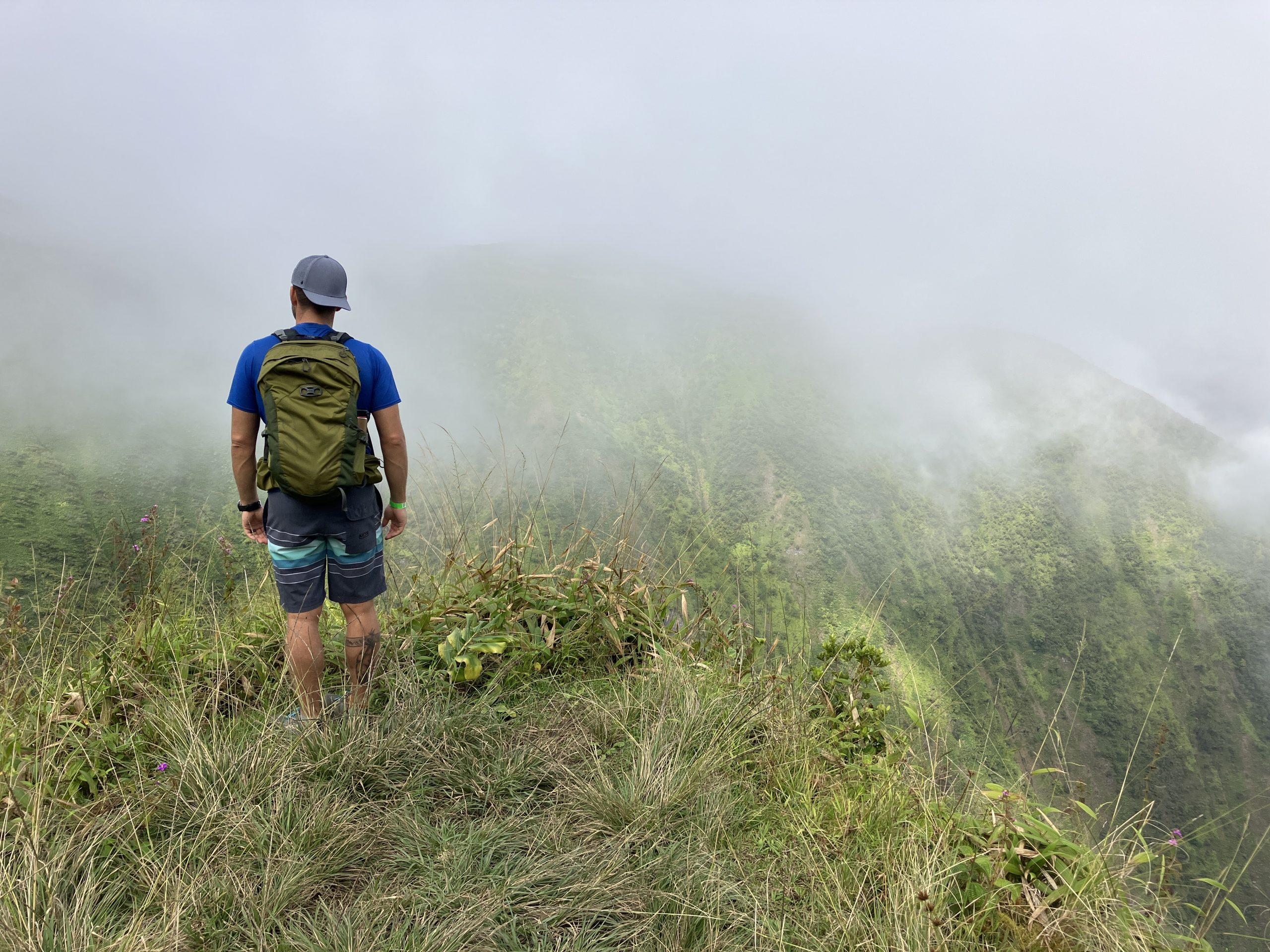 a man hiking in the fog