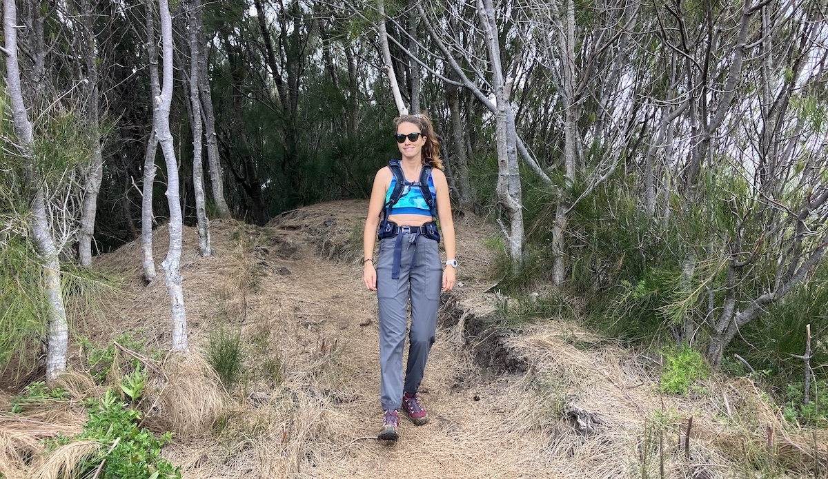 a woman hiking in patagonia hiking pants