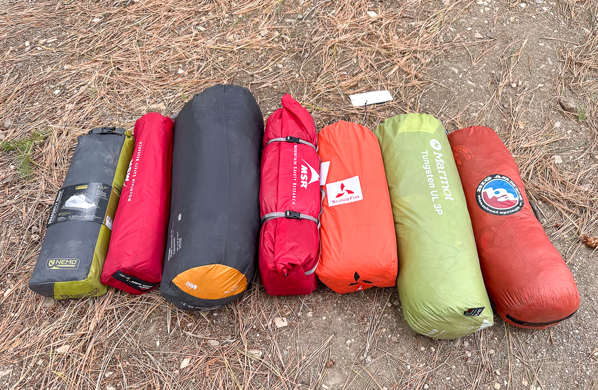 seven tents lined up to show packed size