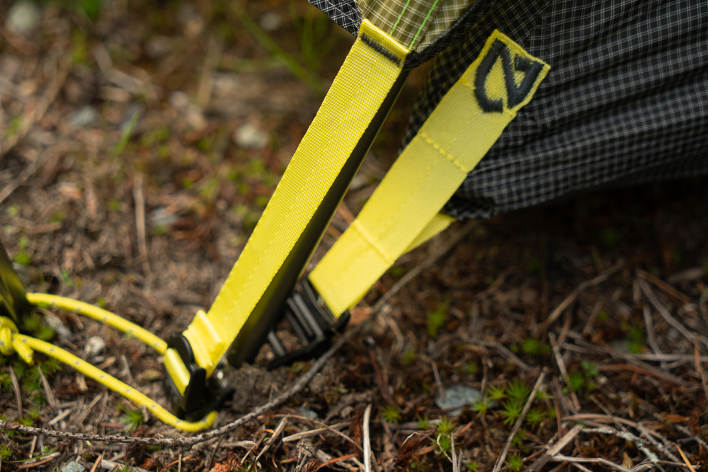 a close up of the stakes and attachment points to the poles on the Nemo Dagger Osmo 3P backpacking tent