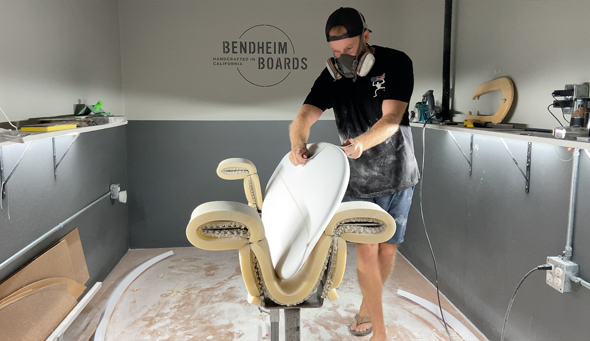 Tanner Bendheim shaping one of the 25 boards hes made over his career. Photo: Tanner Bendheim